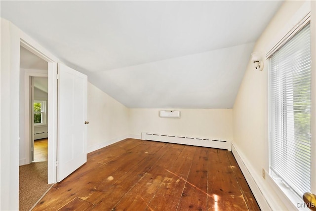 5199 W Lake Rd, Fleming, NY 13021 - bonus room featuring baseboard heating, hardwood / wood-style floors, lofted ceiling, a baseboard radiator, and a wall unit AC