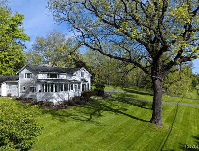 5199 W Lake Rd, Fleming, NY 13021 - rear view of house with a yard