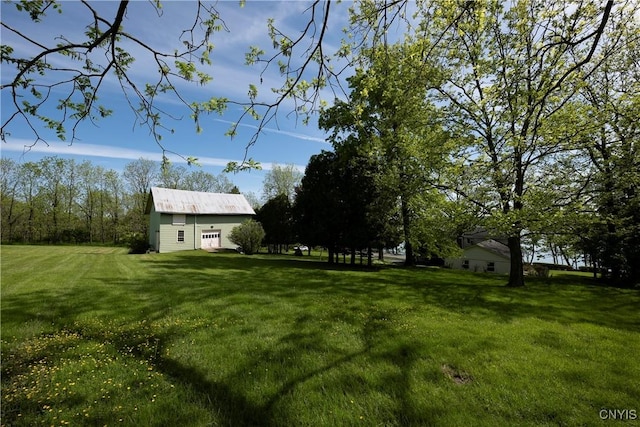 5199 W Lake Rd, Fleming, NY 13021 - view of green lawn featuring an outbuilding