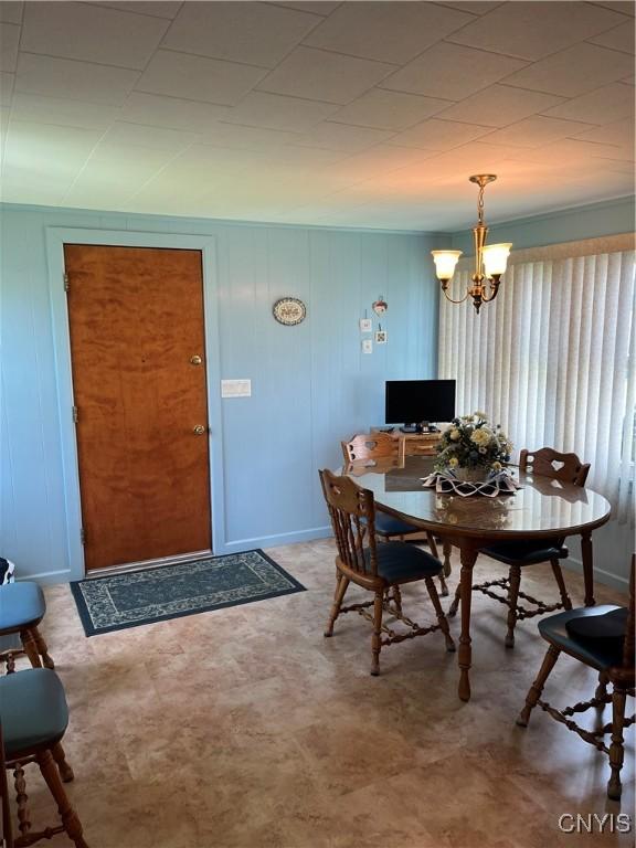 7 Roberts St, Adams, NY 13605 - dining room featuring a chandelier and tile patterned floors