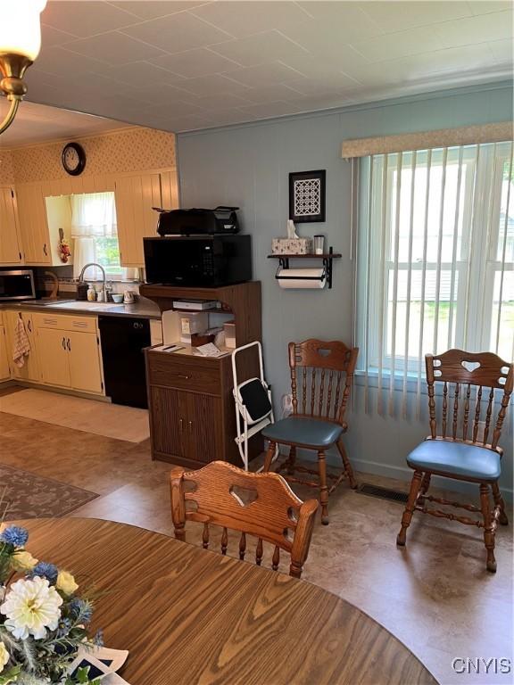 7 Roberts St, Adams, NY 13605 - dining room with light flooring and baseboards