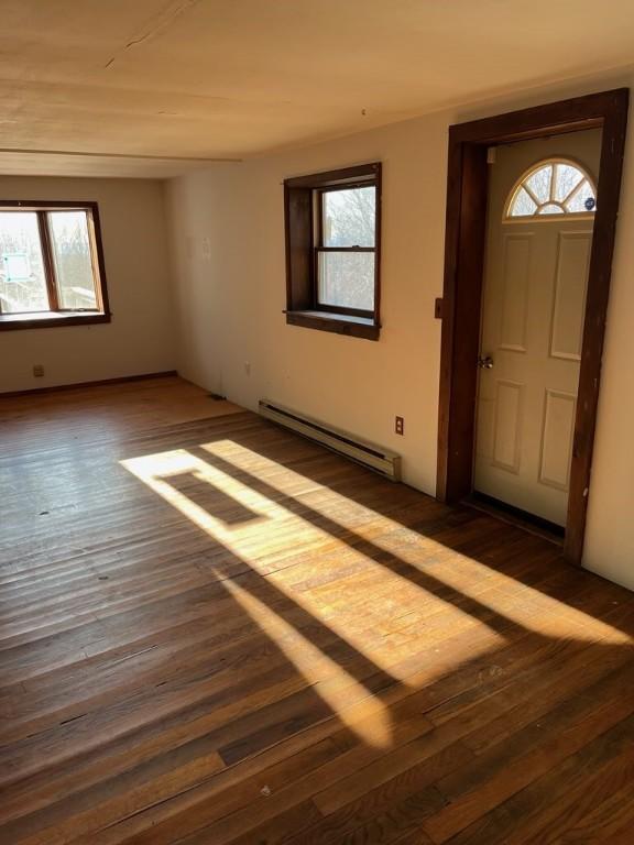 3709 Dean Rd, Hector, NY 14869 - entrance foyer with a baseboard heating unit, hardwood / wood-style floors, and healthy amount of natural light