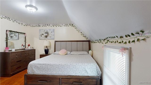 239 Keystone St, Buffalo, NY 14211 - bedroom with lofted ceiling and wood finished floors