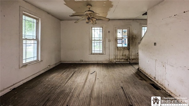 380 Ontario St, Lockport-City, NY 14094 - unfurnished dining area with healthy amount of natural light, hardwood / wood-style floors, and ceiling fan