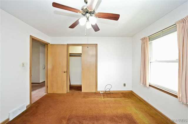 1104 98th St, Niagara Falls, NY 14304 - unfurnished bedroom with carpet floors, a closet, ceiling fan, and baseboards