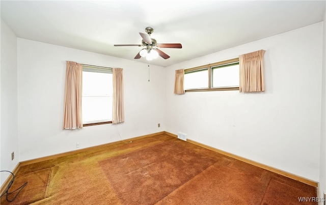 1104 98th St, Niagara Falls, NY 14304 - carpeted empty room featuring a ceiling fan and baseboards