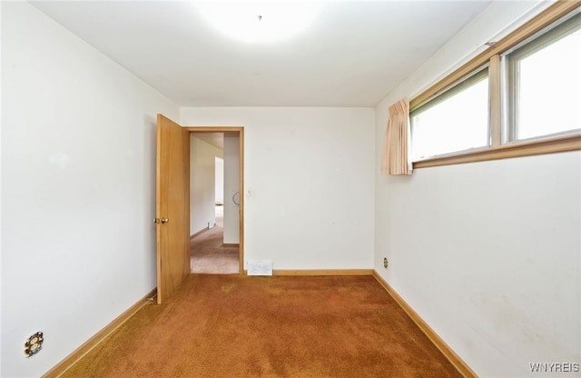 1104 98th St, Niagara Falls, NY 14304 - empty room with carpet floors and baseboards