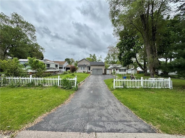 77 Mosley Rd, Greece, NY 14616 - view of front facade with asphalt driveway and an attached garage