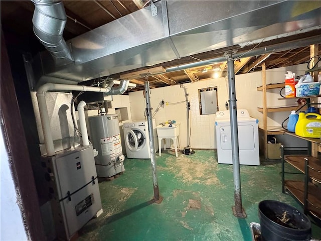 77 Mosley Rd, Greece, NY 14616 - unfinished below grade area with independent washer and dryer, gas water heater, and a sink
