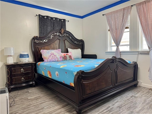 77 Mosley Rd, Greece, NY 14616 - bedroom with wood finished floors and baseboards