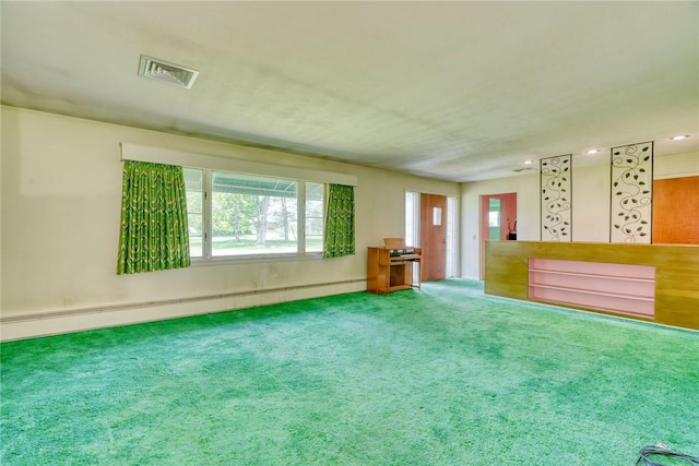 492 Drumm Rd, Webster, NY 14580 - carpeted spare room featuring plenty of natural light and a baseboard radiator