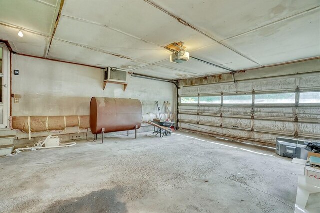 492 Drumm Rd, Webster, NY 14580 - garage with oil tank and a garage door opener
