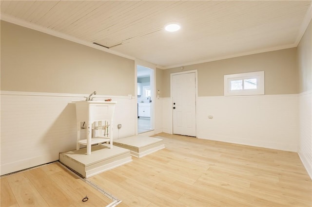 225 Wilder St, Rochester, NY 14611 - empty room with a wainscoted wall, ornamental molding, light wood-type flooring, a sink, and wooden ceiling