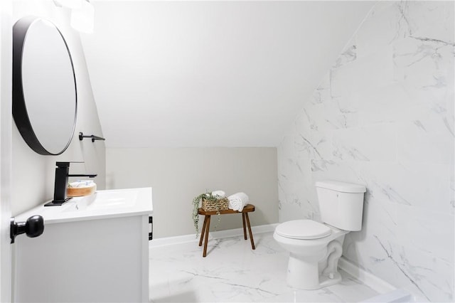 225 Wilder St, Rochester, NY 14611 - bathroom with toilet, marble finish flooring, vanity, and vaulted ceiling