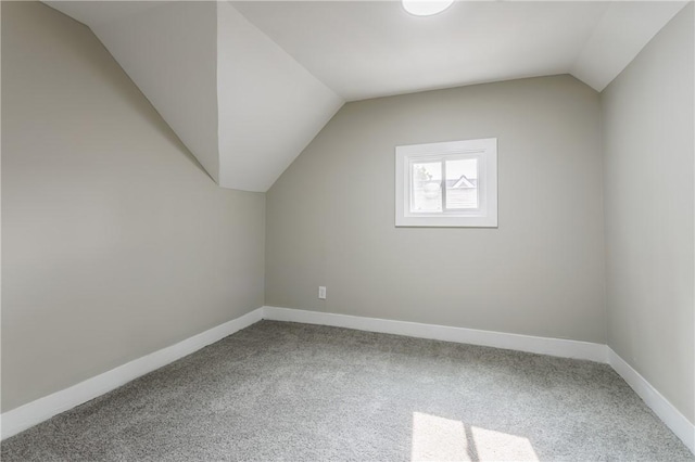 225 Wilder St, Rochester, NY 14611 - bonus room with carpet, vaulted ceiling, and baseboards