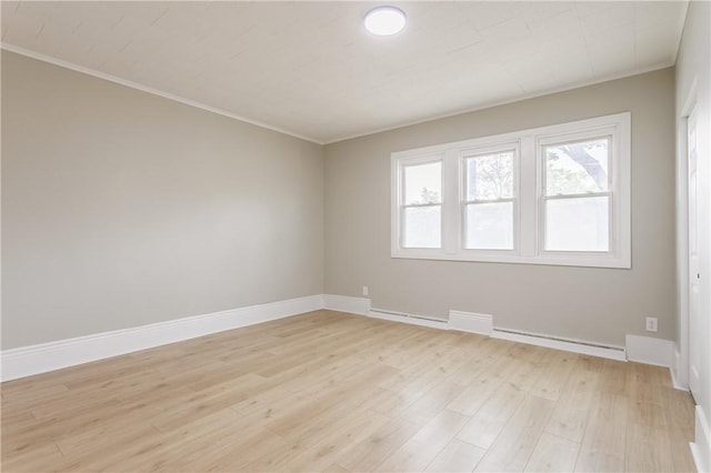 225 Wilder St, Rochester, NY 14611 - spare room featuring light wood-style flooring, plenty of natural light, crown molding, and baseboards