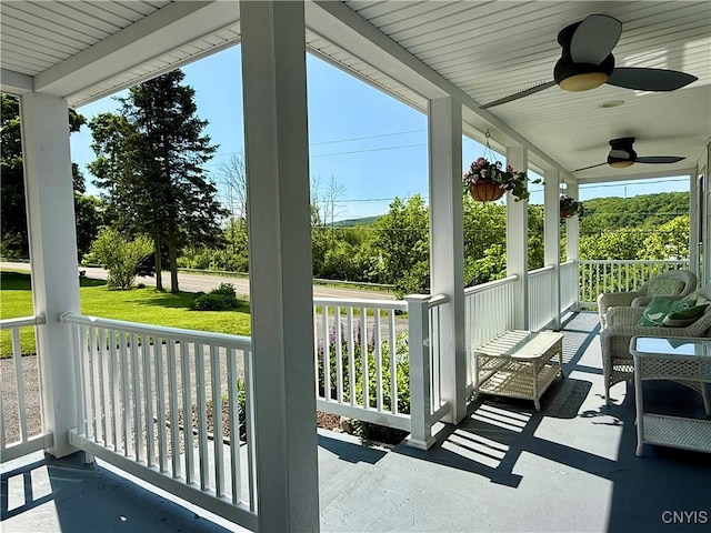 3228 Cedarvale Rd, Onondaga, NY 13120 - covered porch with a ceiling fan