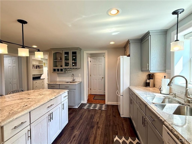 3228 Cedarvale Rd, Onondaga, NY 13120 - kitchen with a sink, freestanding refrigerator, dishwashing machine, gray cabinetry, and recessed lighting