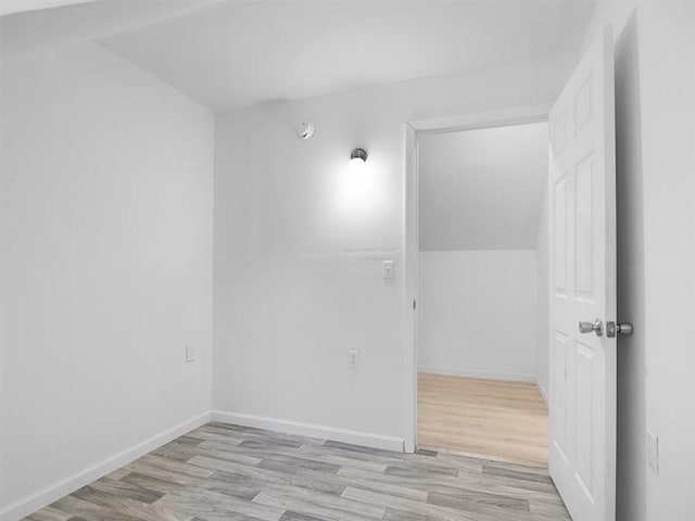 13376 Ridge Rd, Wolcott, NY 14590 - spare room featuring wood finished floors, baseboards, and a smoke detector