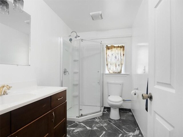 13376 Ridge Rd, Wolcott, NY 14590 - full bath featuring marble look tiles, vanity, a stall shower, and toilet