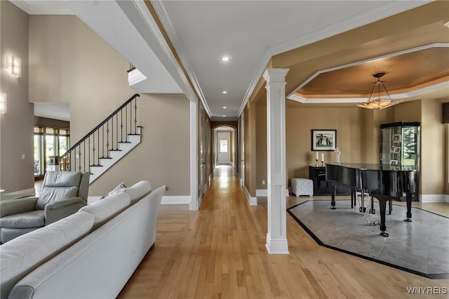 35 Pinegrove Ct, Elma, NY 14059 - corridor featuring ornate columns, baseboards, light wood finished floors, recessed lighting, and ornamental molding