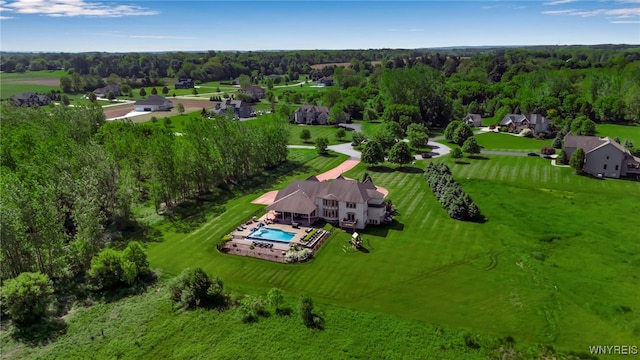 35 Pinegrove Ct, Elma, NY 14059 - aerial view of a pool area and a heavily wooded area