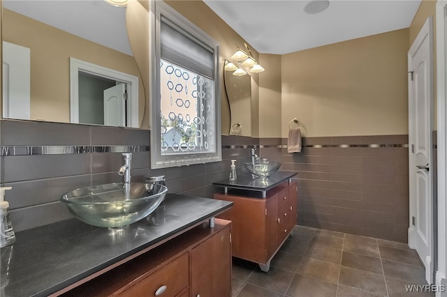 35 Pinegrove Ct, Elma, NY 14059 - bathroom featuring tile walls, tile patterned floors, two vanities, and wainscoting
