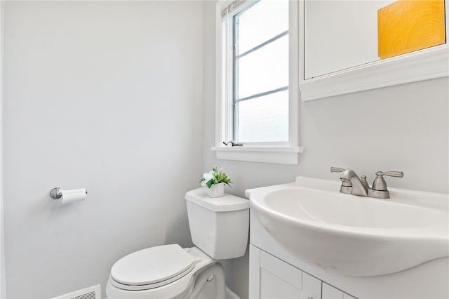 62 E Park Rd, Pittsford, NY 14534 - bathroom with plenty of natural light, vanity, and toilet