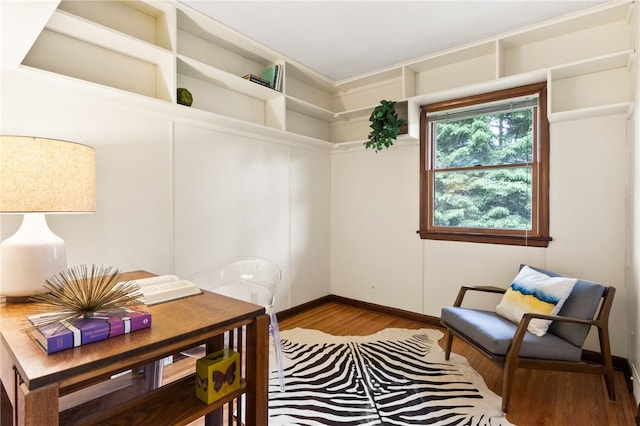62 E Park Rd, Pittsford, NY 14534 - sitting room featuring wood finished floors and baseboards