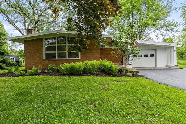 62 E Park Rd, Pittsford, NY 14534 - mid-century inspired home featuring a chimney, an attached garage, a front yard, driveway, and brick siding