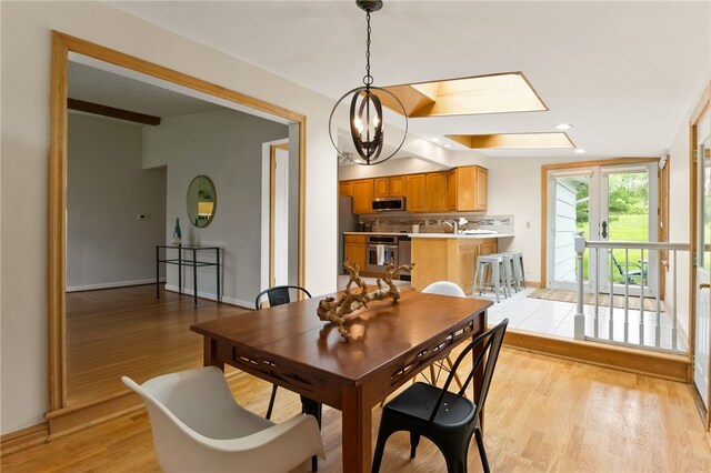 62 E Park Rd, Pittsford, NY 14534 - dining room featuring light wood-style floors and baseboards