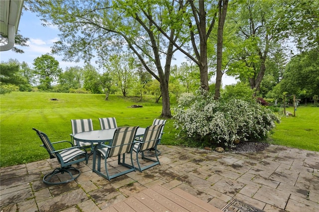 62 E Park Rd, Pittsford, NY 14534 - view of patio / terrace featuring outdoor dining area and view of wooded area