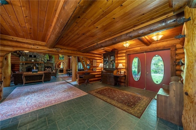 1860 Whiskey Creek Rd, Caton, NY 14830 - foyer entrance with log walls, french doors, and wood ceiling with exposed beams