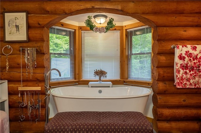 1860 Whiskey Creek Rd, Caton, NY 14830 - full bath with rustic walls, a freestanding bath, and wood finished floors