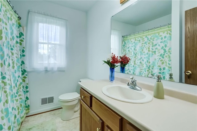 16 Hazel Bark Run, Gates, NY 14606 - full bathroom with vanity, toilet, and a shower with shower curtain