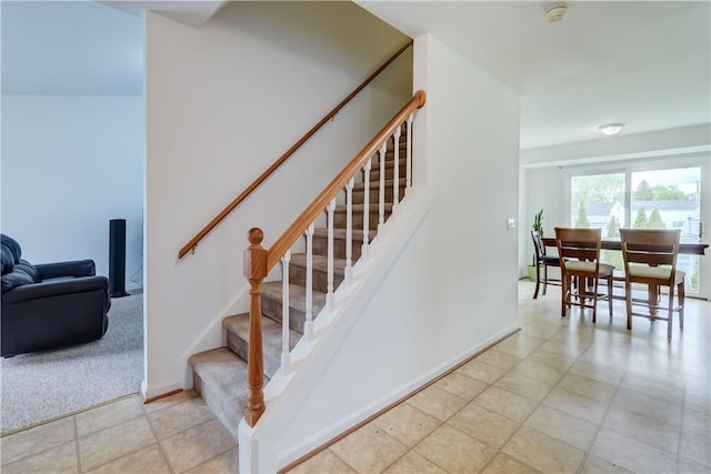 16 Hazel Bark Run, Gates, NY 14606 - stairs with tile patterned flooring and baseboards