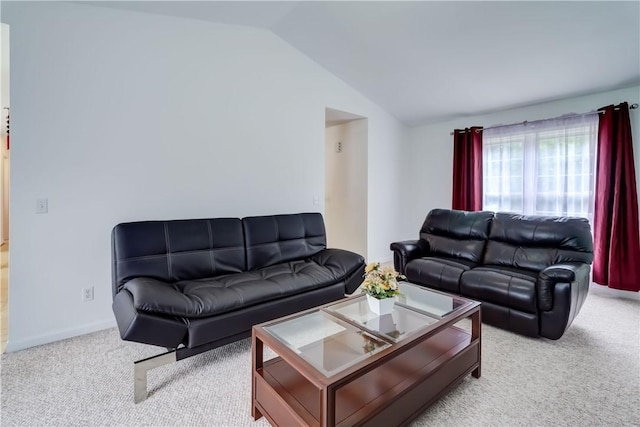 16 Hazel Bark Run, Gates, NY 14606 - carpeted living room featuring lofted ceiling and baseboards