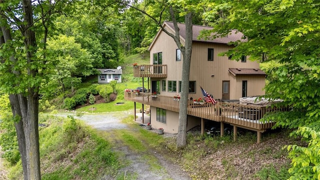 1485 S Lake Rd, Middlesex, NY 14507 - back of house featuring a wooden deck and dirt driveway