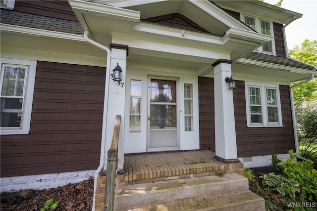 5557 Seneca St, West Seneca, NY 14224 - doorway to property featuring covered porch