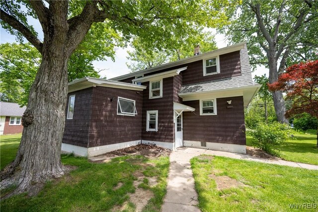 5557 Seneca St, West Seneca, NY 14224 - view of front of property with a front lawn