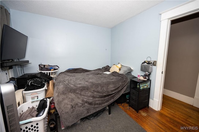 5557 Seneca St, West Seneca, NY 14224 - bedroom featuring wood finished floors and baseboards