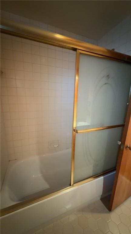 153 Carlisle St, Greece, NY 14615 - bathroom featuring enclosed tub / shower combo and tile patterned flooring
