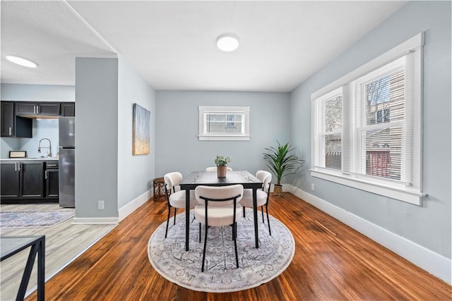 37 Ernestine St, Rochester, NY 14619 - dining area featuring baseboards and wood finished floors