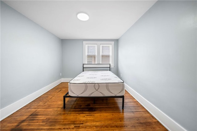 37 Ernestine St, Rochester, NY 14619 - bedroom with baseboards and wood finished floors