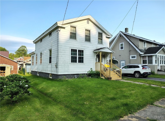 233 Elm St, German Flatts, NY 13357 - traditional-style house with a front yard