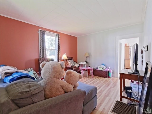 233 Elm St, German Flatts, NY 13357 - living area with ornamental molding and light wood finished floors