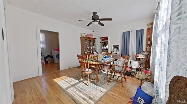 233 Elm St, German Flatts, NY 13357 - dining room featuring wood finished floors and a ceiling fan