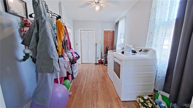 233 Elm St, German Flatts, NY 13357 - washroom with light wood finished floors, ceiling fan, and washer and dryer