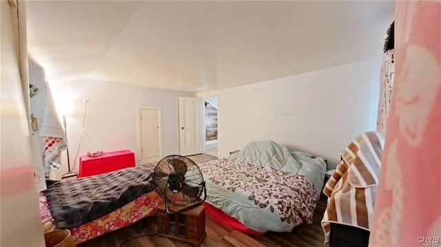 233 Elm St, German Flatts, NY 13357 - bedroom featuring wood finished floors and lofted ceiling