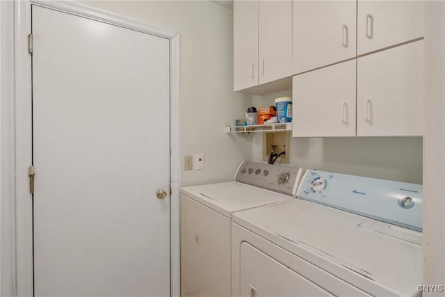 112 Ausable Run, Salina, NY 13088 - laundry area featuring separate washer and dryer and cabinet space